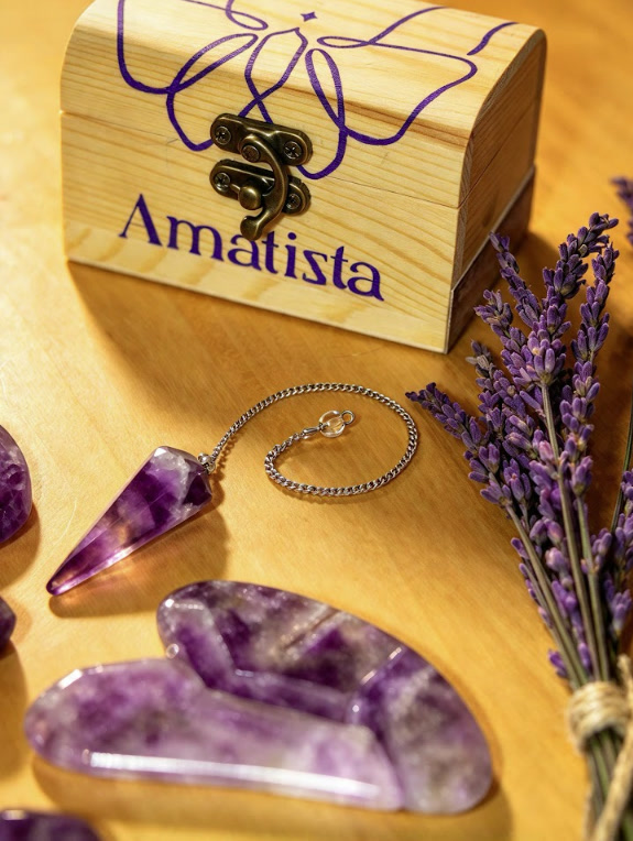 Small Amatizta wooden box with an amethyst pendulum, a heart-shaped stone and lavender